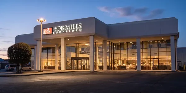 Bob Mills Furniture – storefront exterior at dusk