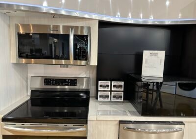 Colder's – appliance showroom with stove and range displays