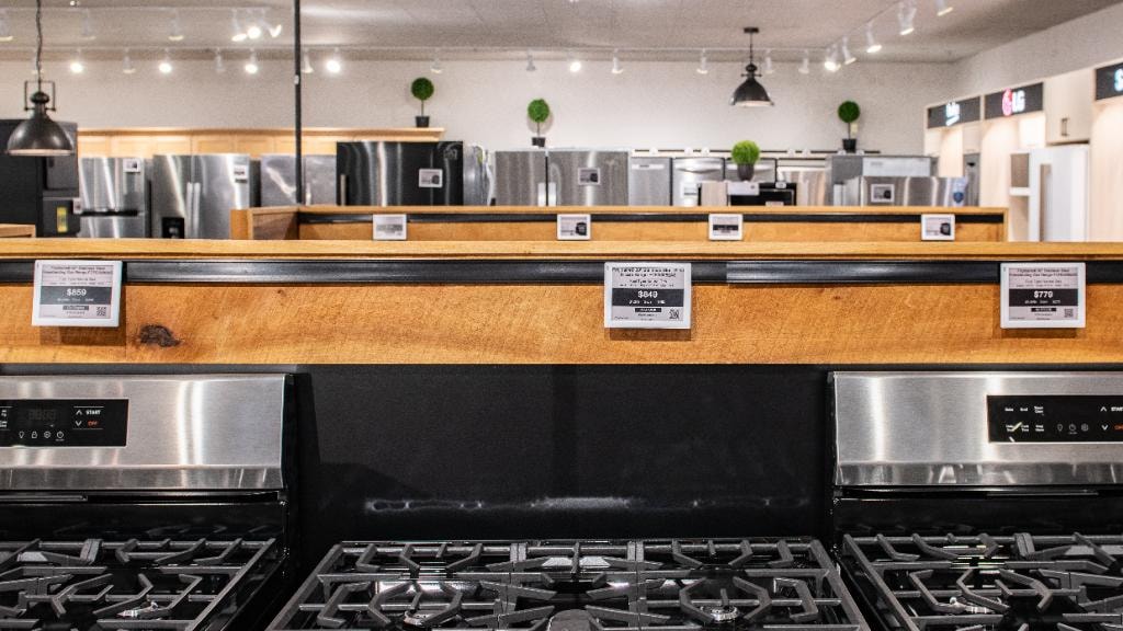 Colder's – stove and range showroom floor with ESL price tags showing $859, $849, and $779