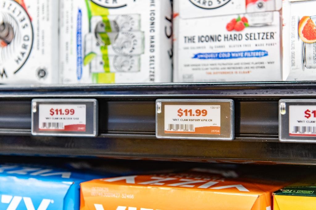 ESL – White Claw hard seltzer shelf close-up showing ESL tags at $11.99