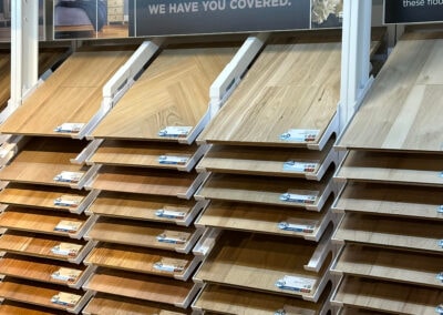 Sergenian's – hardwood flooring sample display wall with ESLs