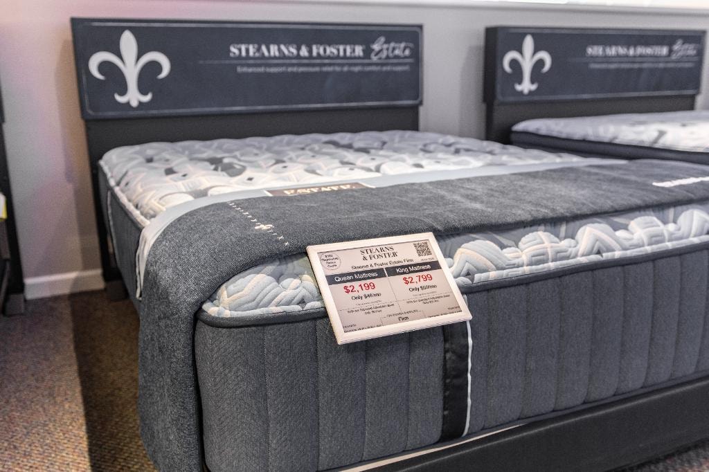 Steinhafels – Stearns & Foster Estate mattress display with ESL price tag showing Queen $2,199 and King $2,799