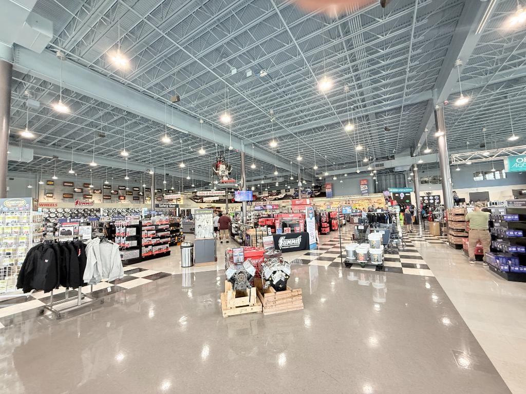 Summit Racing – vast store interior with checkered floor and product displays